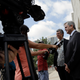 Austin Mayor Steve Adler, right, talk with the media outside the federal courthouse, Thursday, June 29, 2017, in Austin, Texas. Adler is one of more than 100 US mayors to sign the Cities Open Internet Pledge